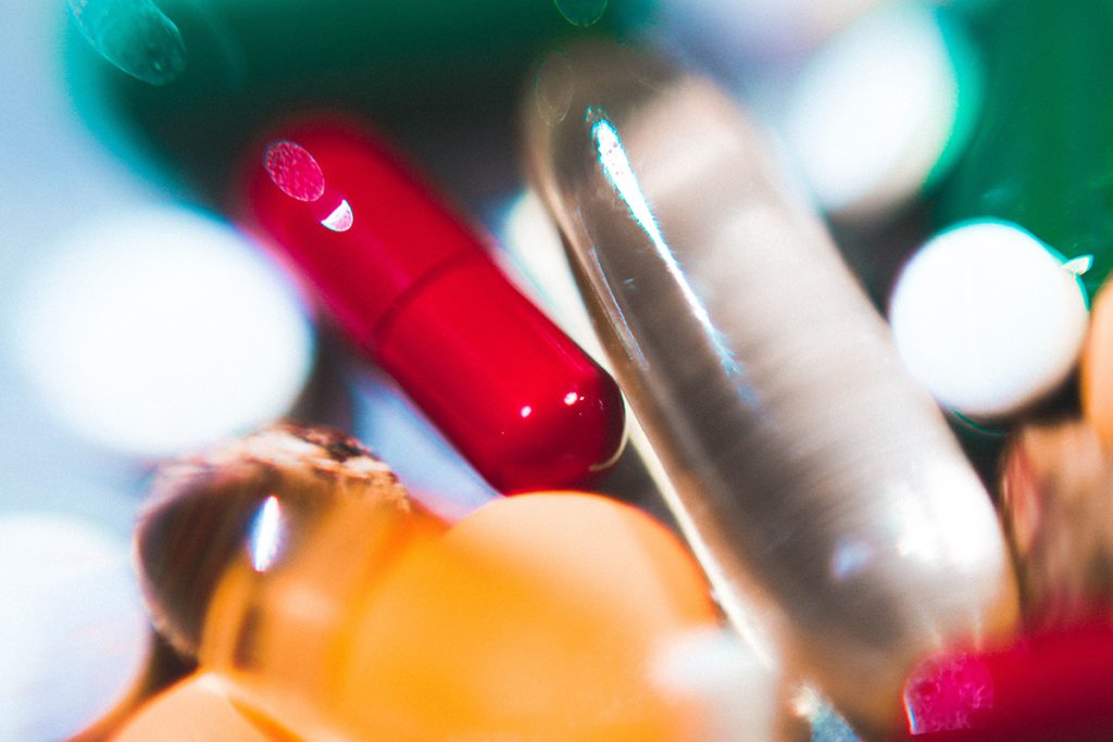 Close-up of a variety of medications in pill and capsule form