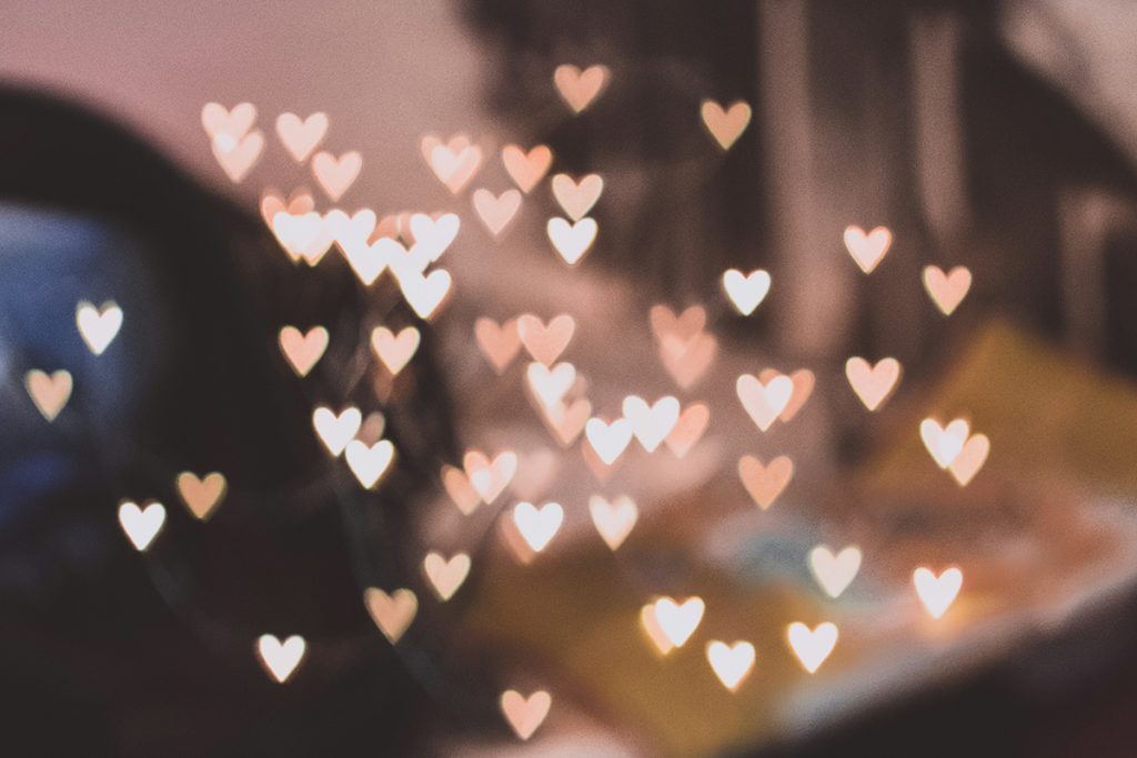 scattering of hearts across a blurred background